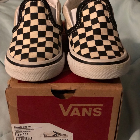 white vans slip ons size 4